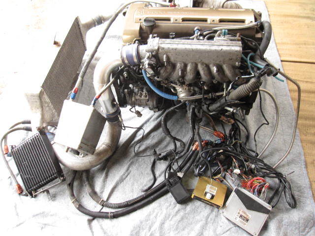 Working 2JZ-GTE engine with HKS T51R-kai turbo, exhaust manifold, F-CON V Pro, high-lift camshaft, metal gasket, injectors, and wiring harness. Fits JZA80, JZS147, and JZZ30. - Image 2